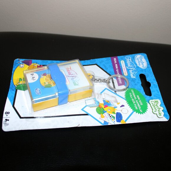 3/$77❤️sealed Hasbro Gaming Keychain Games TRIVIAL PURSUIT Mini Size Board Game - Picture 3 of 4